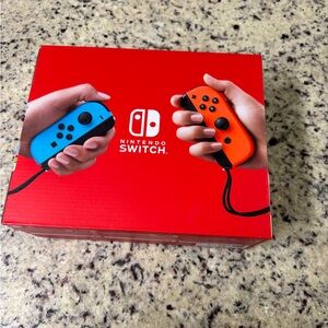 NEW IN BOX - Nintendo Switch Console - Vibrant Red and Blue